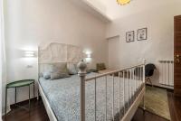 Posteľ alebo postele v izbe v ubytovaní Roma Termini Big Apartment