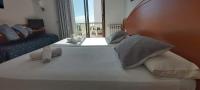 Posteľ alebo postele v izbe v ubytovaní Hotel Bonsol