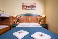 Łóżko lub łóżka w pokoju w obiekcie Hotel Trastevere