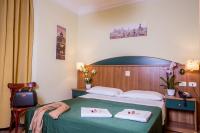 Łóżko lub łóżka w pokoju w obiekcie Hotel Trastevere