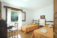 A bed or beds in a room at Owl Booking Villa Vallori - 5 Min Walk to the Beach