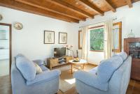 A seating area at Owl Booking Villa Vallori - 5 Min Walk to the Beach