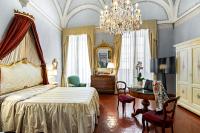 Posteľ alebo postele v izbe v ubytovaní Residenza d'Epoca Palazzo Borghesi