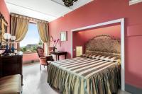 Posteľ alebo postele v izbe v ubytovaní Residenza d'Epoca Palazzo Borghesi