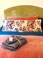 Een bed of bedden in een kamer bij Petit R&ecirc;ve