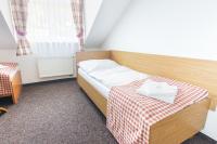 Postel nebo postele na pokoji v ubytování Hotel Seifert
