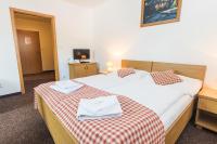 Postel nebo postele na pokoji v ubytování Hotel Seifert