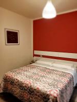 Posteľ alebo postele v izbe v ubytovaní B&b La Rocca