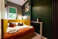 Posteľ alebo postele v izbe v ubytovaní Candy Apartments Warszawa