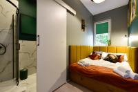 Posteľ alebo postele v izbe v ubytovaní Candy Apartments Warszawa