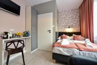 Posteľ alebo postele v izbe v ubytovaní Candy Apartments Warszawa