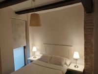 Posteľ alebo postele v izbe v ubytovaní Apartamento Gutenberg