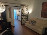 Posedenie v ubytovaní Apartamento Gutenberg