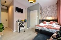 Posteľ alebo postele v izbe v ubytovaní Candy Apartments Warszawa