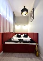 Posteľ alebo postele v izbe v ubytovaní Candy Apartments Warszawa