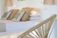Posteľ alebo postele v izbe v ubytovaní Avali Deluxe Suites