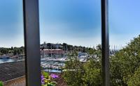 a view of a marina from a window at Romana Serena Sunset in Vrsar