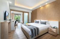 Poseidon Hotel Sea Resortにあるベッド