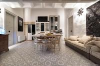 A kitchen or kitchenette at Palazzo Mandurino luxury relais