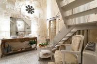 A seating area at Palazzo Mandurino luxury relais
