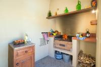 A kitchen or kitchenette at Owl Booking Villa Vallori - 5 Min Walk to the Beach