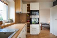 Kuchyň nebo kuchyňský kout v ubytování Vila Věkoše - apartmán s terasou a zahradou