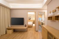 广州友和酒店Yuwa Hotel-Free Shuttle Bus to Canton Fair Complex DuringCanton Fair Periodにあるテレビまたはエンターテインメントセンター