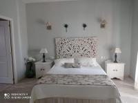 Posteľ alebo postele v izbe v ubytovaní Finca La Favorita- Suites