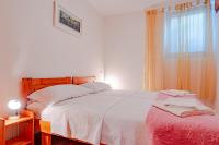 Posteľ alebo postele v izbe v ubytovaní Apartment Ružica
