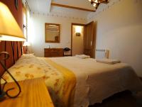 Cama o camas de una habitación en Apartamentos Rurales San Juan