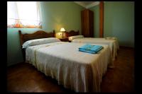Cama o camas de una habitación en Apartamentos Rurales San Juan