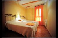 Cama o camas de una habitación en Apartamentos Rurales San Juan