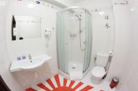 Kúpeľňa v ubytovaní GarageHotel