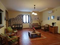 A seating area at Le Coste Affittacamere