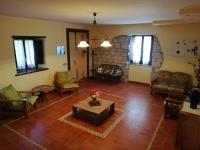 A seating area at Le Coste Affittacamere