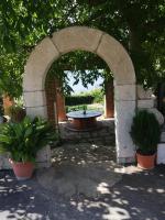 A garden outside Le Coste Affittacamere