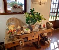 a table with fruits and vegetables on top of it at Agriturismo La Vigna di Sarah in Vittorio Veneto