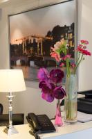 Een TV en/of entertainmentcenter bij Hotel Residence Le Coin

