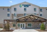 a rendering of a werkering hotel at WoodSpring Suites Fort Mill in Fort Mill