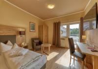 Postel nebo postele na pokoji v ubytování Wellnesshotel deine Auszeit, Adults only