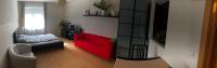 A seating area at Cozy Apartment in District 8