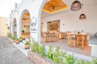 Reštaurácia alebo iné gastronomické zariadenie v ubytovaní Tarsa Studios