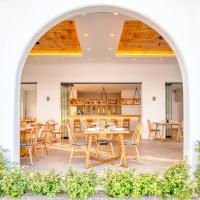 Reštaurácia alebo iné gastronomické zariadenie v ubytovaní Tarsa Studios