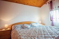 Posteľ alebo postele v izbe v ubytovaní Apartment Luciana 1