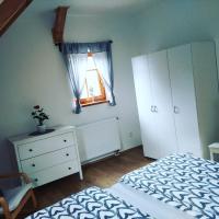 Postel nebo postele na pokoji v ubytování Apartmány u vlčích jam