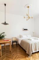 Łóżko lub łóżka w pokoju w obiekcie Wesoła Apartments