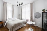 Łóżko lub łóżka w pokoju w obiekcie Wesoła Apartments