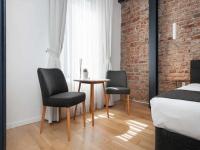 A bed or beds in a room at Taxim No18 Boutique Hotel