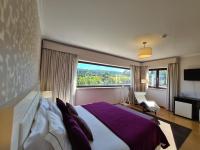 Uma cama ou camas num quarto em Quinta de Santo Estêvão Hotel Rural
