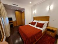 Uma cama ou camas num quarto em Quinta de Santo Estêvão Hotel Rural